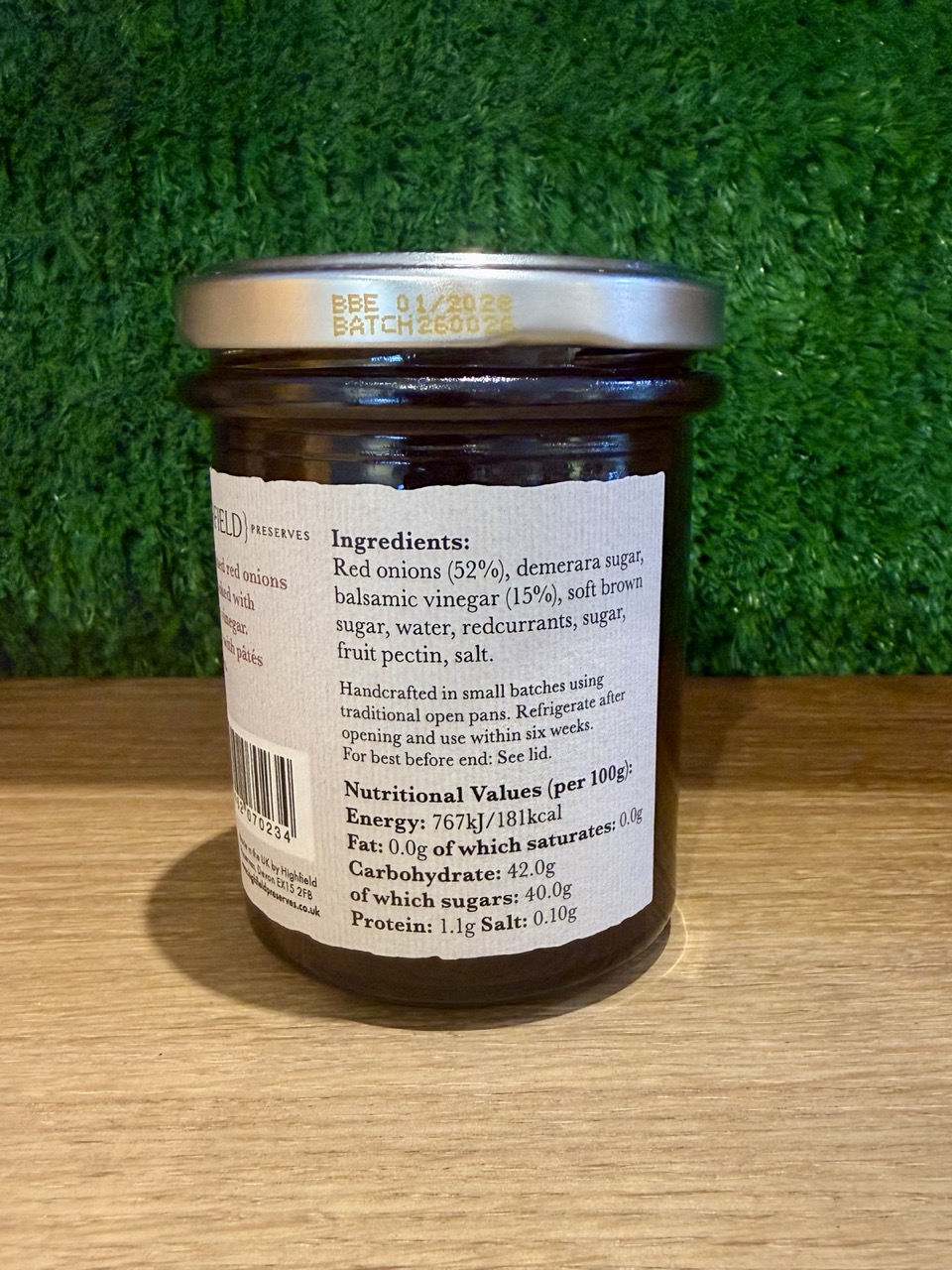 A picture of the back of a jar of red onion marmalade. It shows the ingredients