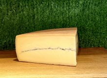 A picture of Ashcombe - a cheese with a distinctive line of ash running through it.